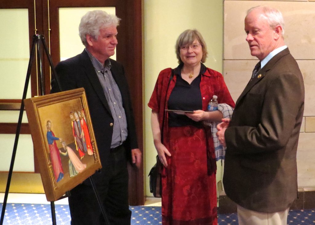 William Brown (L), chief conservator of the North Carolina Museum of Art, and Ingrid Daubechies, professor of mathematics at Duke, show their recreation of a portion of an altarpiece by Giotto to Rep. Jerry McNerney (D-CA) - the only Member of Congress with a PhD in mathematics.
